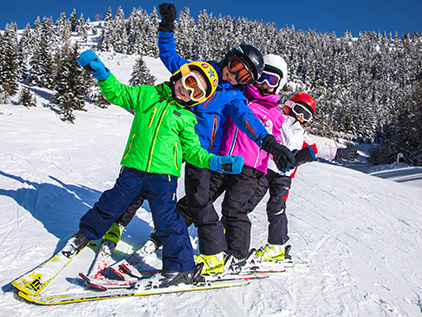 A group of children having fun skiing