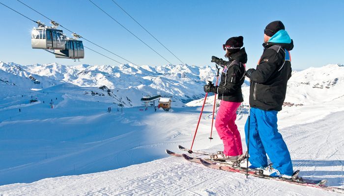 Skiers looking at view