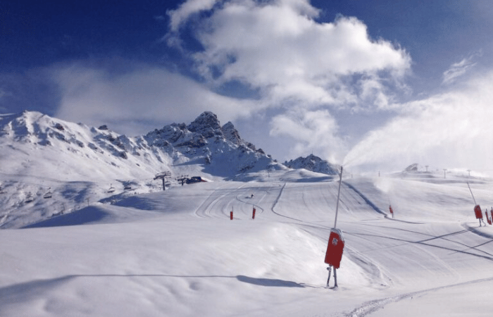 A piste in Meribel with blue skies